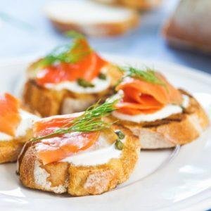 Smoked salmon crostini with cheese,caper and dill